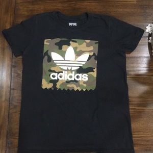 Black adidas shirt with a camo box